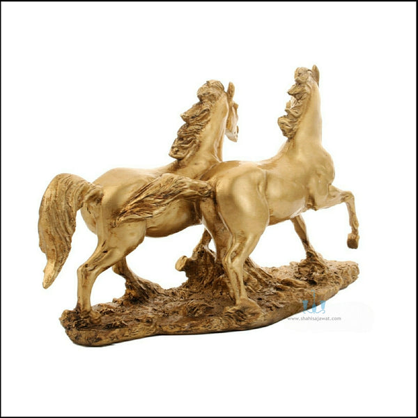 Gold Resin Twin Galloping Horses Tabletop Figurine, Available Exclusively On Shahi Sajawat India, the world of home decor products. Best trendy home decor, office decor, table decor living room, kitchen and bathroom decor ideas of 2023.