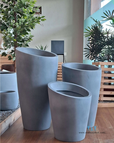 Light Grey Abstract Vase Shaped FRP (Fiberglass) Indoor And Outdoor Planters Are Lightweight, Durable, Weather Resistant, UV Resistant Made For Residential And Commercial Spaces, Available Exclusively On Shahi Sajawat India, the world of home decor products. Best trendy home decor, office decor, restaurant decor, hotel decor, airports, mall decor ideas of 2024.