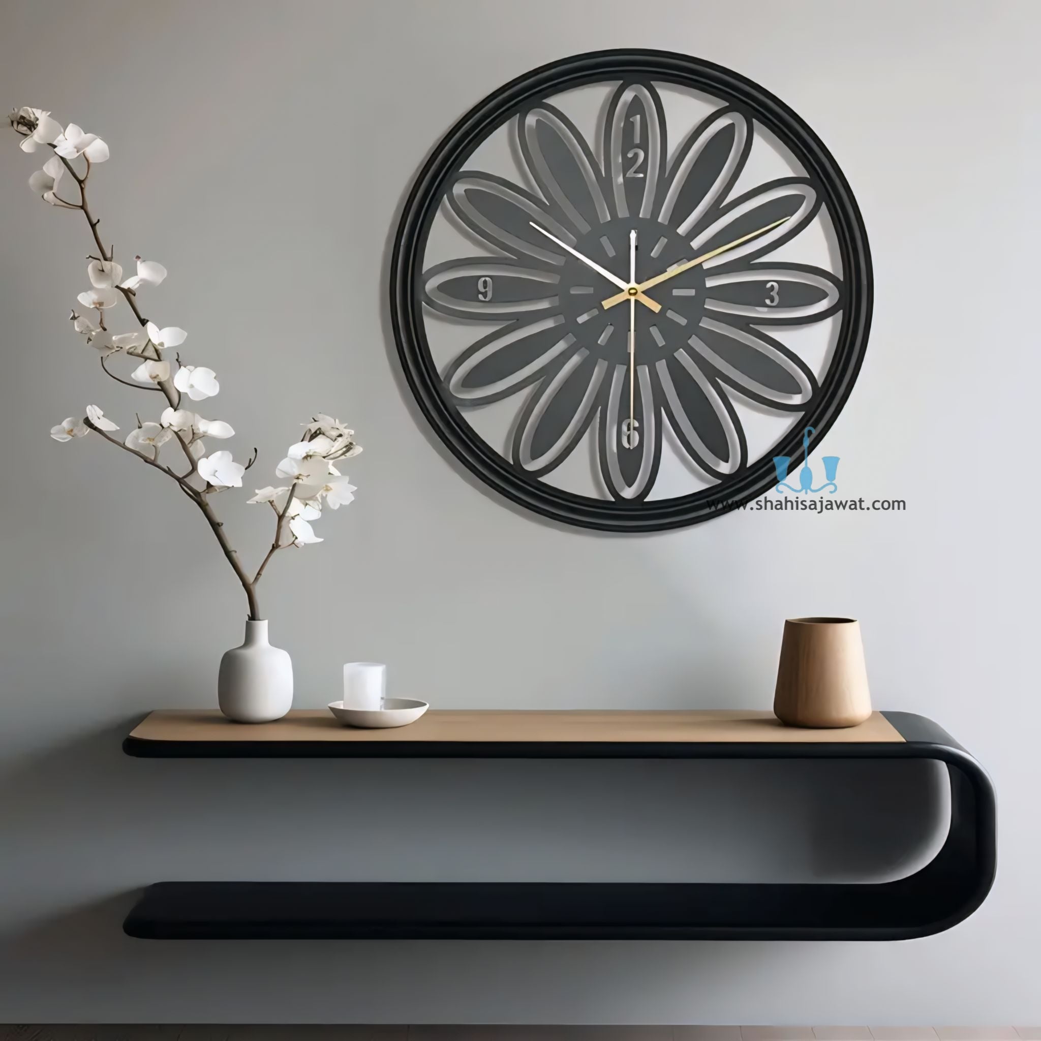 Gold/Black Floral Handcrafted Quartz Metal (Iron) Modern Wall Clock With Single Face Form And Needle Display, available exclusively on Shahi Sajawat India, the world of home decor products.Best trendy home decor, office decor, restaurant decor, living room, kitchen and bathroom decor ideas of 2025.