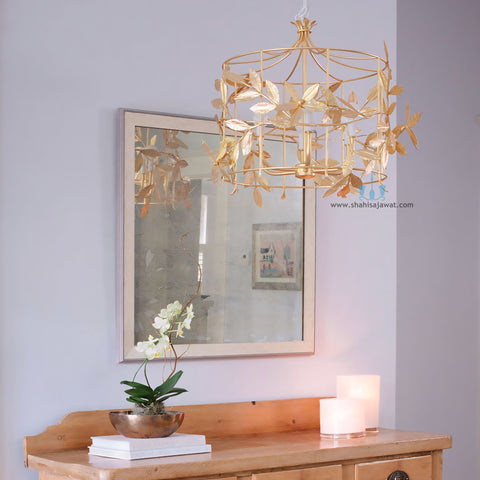 Gold Floral Iron Cage Handcrafted Chandelier With 6 Candelabra Base Bulbs, AC Power Source and Voltage Of 90-260V, Available exclusively on Shahi Sajawat India,the world of home decor products.Best trendy home decor, office, restaurant, living room and kitchen decor ideas of 2025.